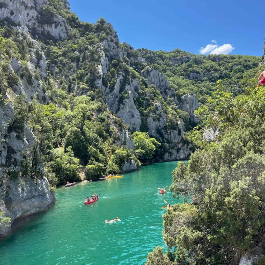 Dramatic Todra Gorge in Morocco with emerald green water and towering limestone cliffs perfect for hiking