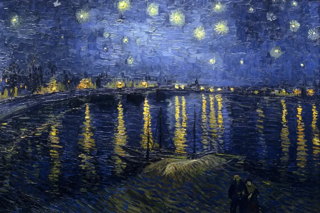 An oil painting by Vincent van Gogh depicting a dark blue starry night sky over the Rhône River, with bright yellow city lights reflecting in long streaks on the water, and two small figures on the riverbank.
