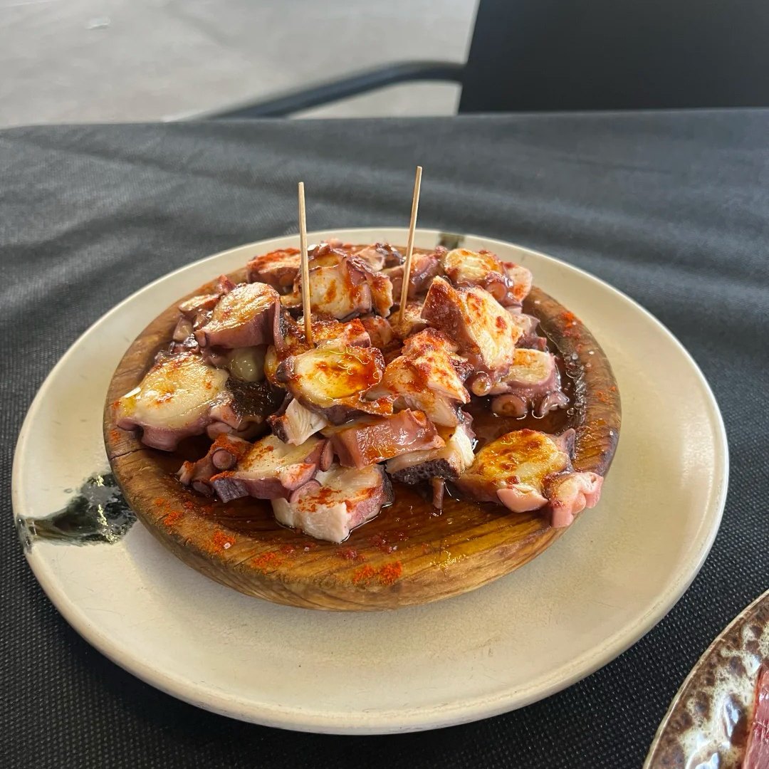 Traditional Galician octopus tapas served along Santiago Ways route
