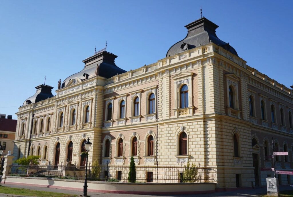 Elegant Austro-Hungarian era baroque building in Belgrade with ornate stonework, arched windows and distinctive architectural details