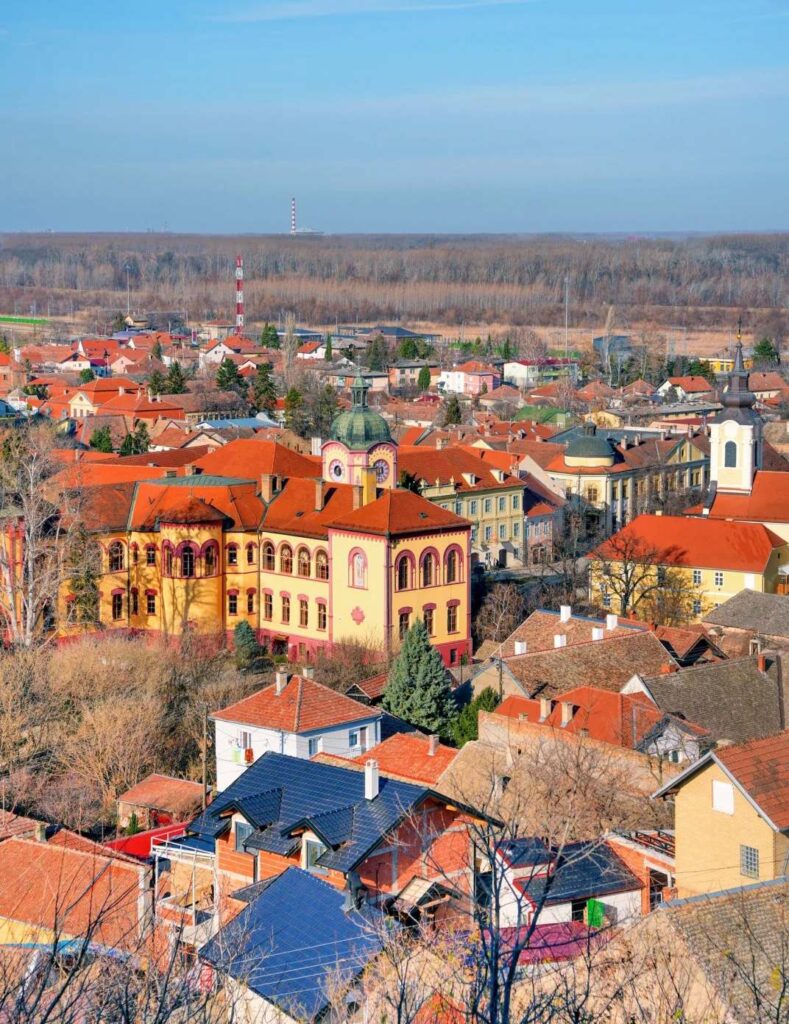 Aerial view of Subotica showing distinctive Art Nouveau buildings with colorful facades and red tile roofs near Hungarian border in northern Serbia