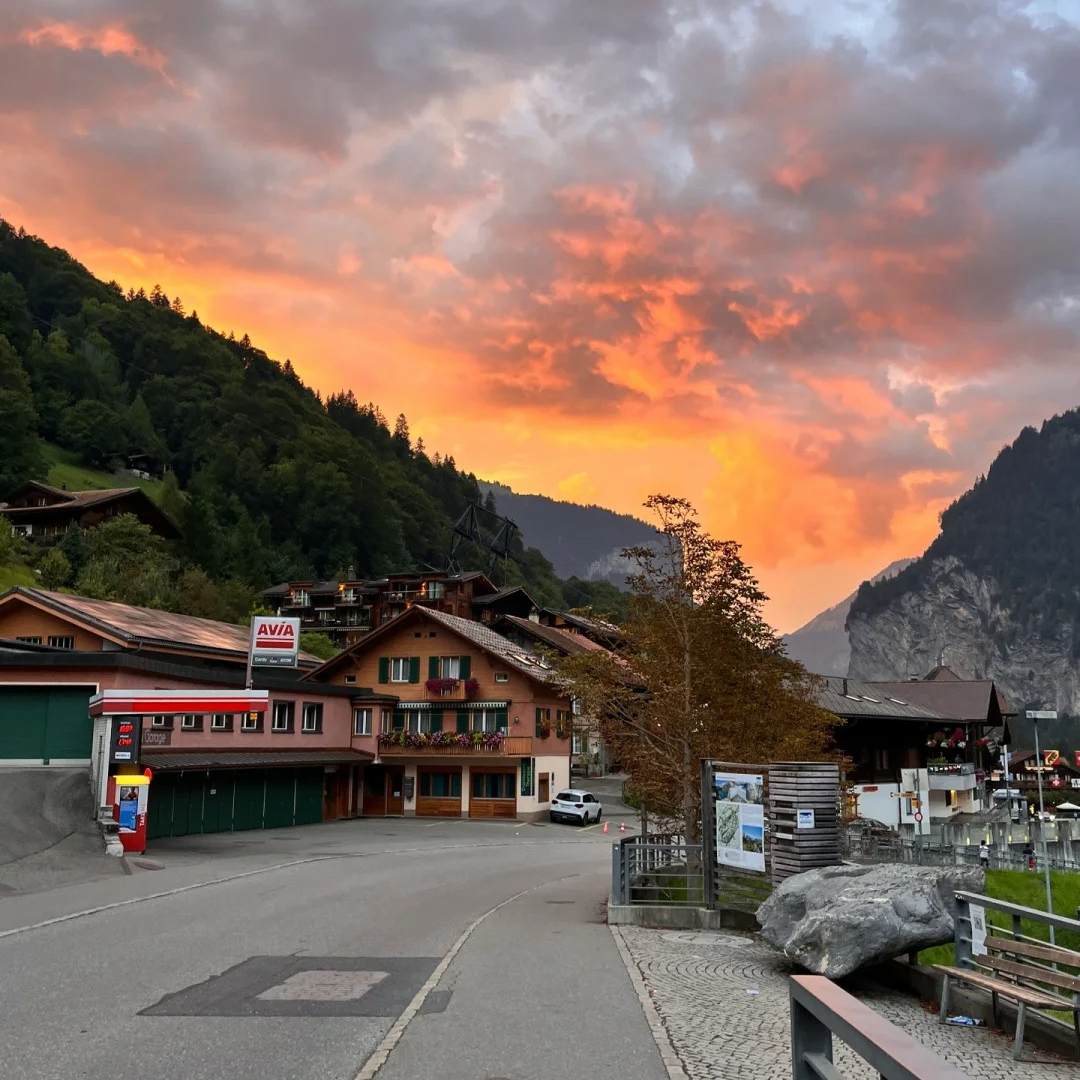 Switzerland itinerary guide alpine village at dramatic sunset