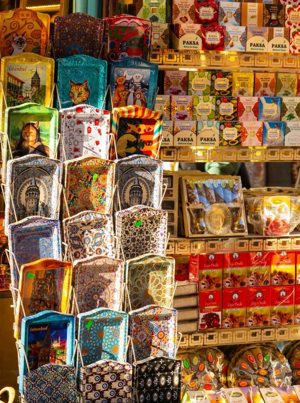 Vibrant collection of Turkish souvenirs including decorative bags, natural soaps, and traditional crafts at local bazaar